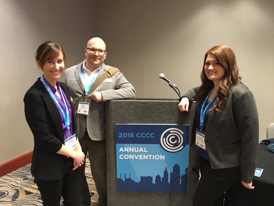 kamila, rob, and mandy at cccc podium