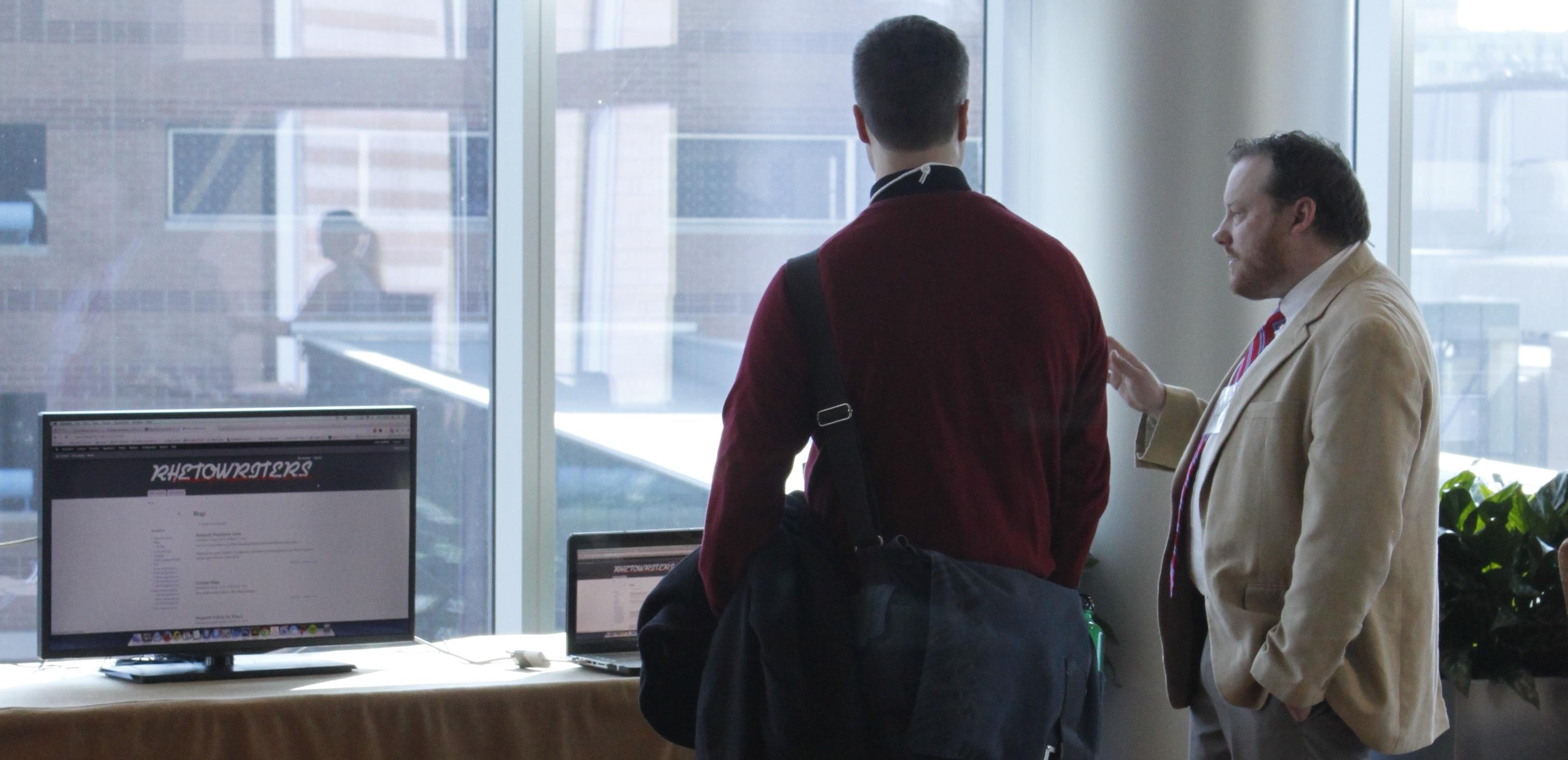 david presenting with computer open